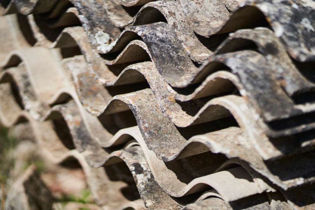 toxic waste with asbestos from piled-up asbestos sheets